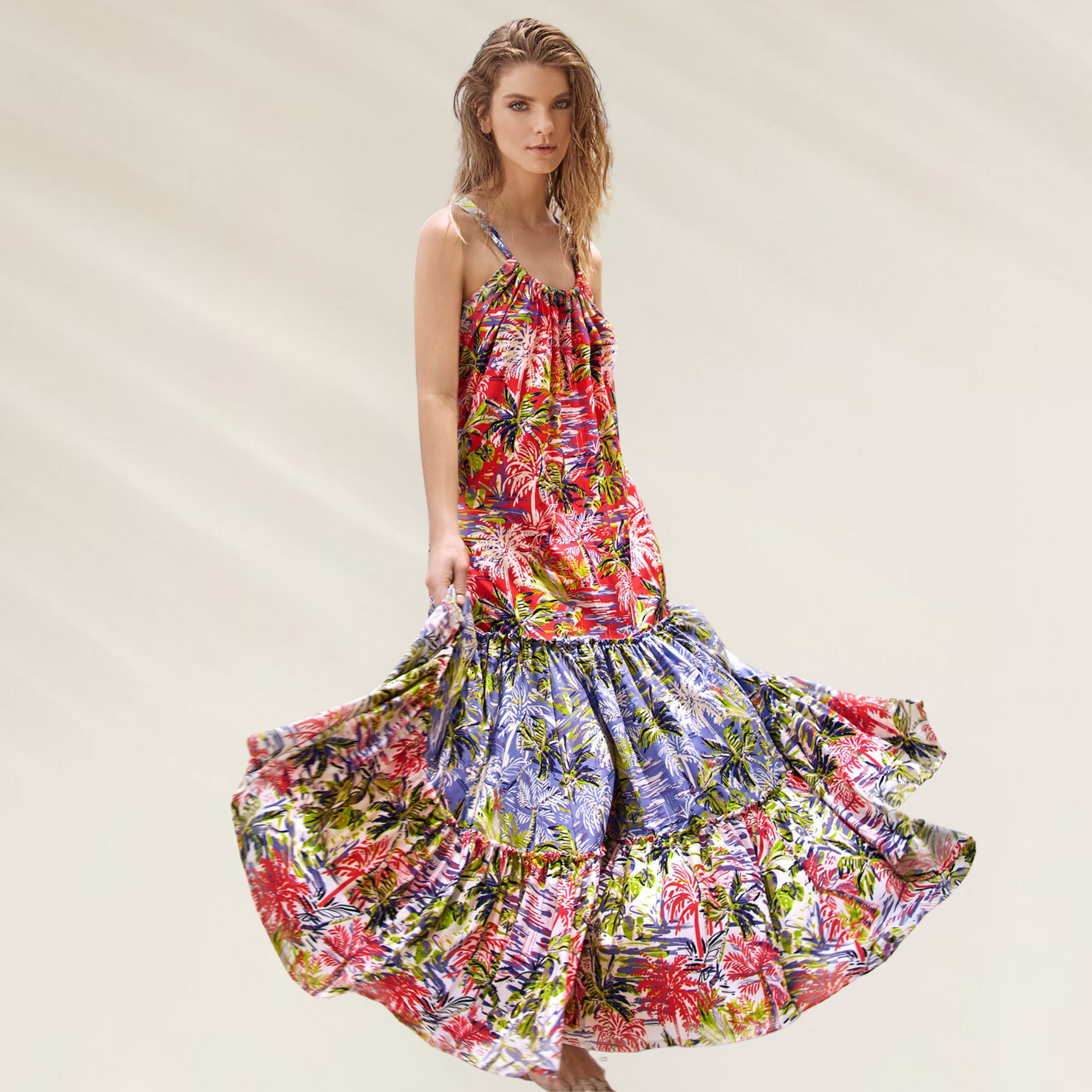 Modelo vestindo um vestido comprido florido da Cosita Linda Um vestido leve fluido e irresistivelmente tropical Cosita Linda