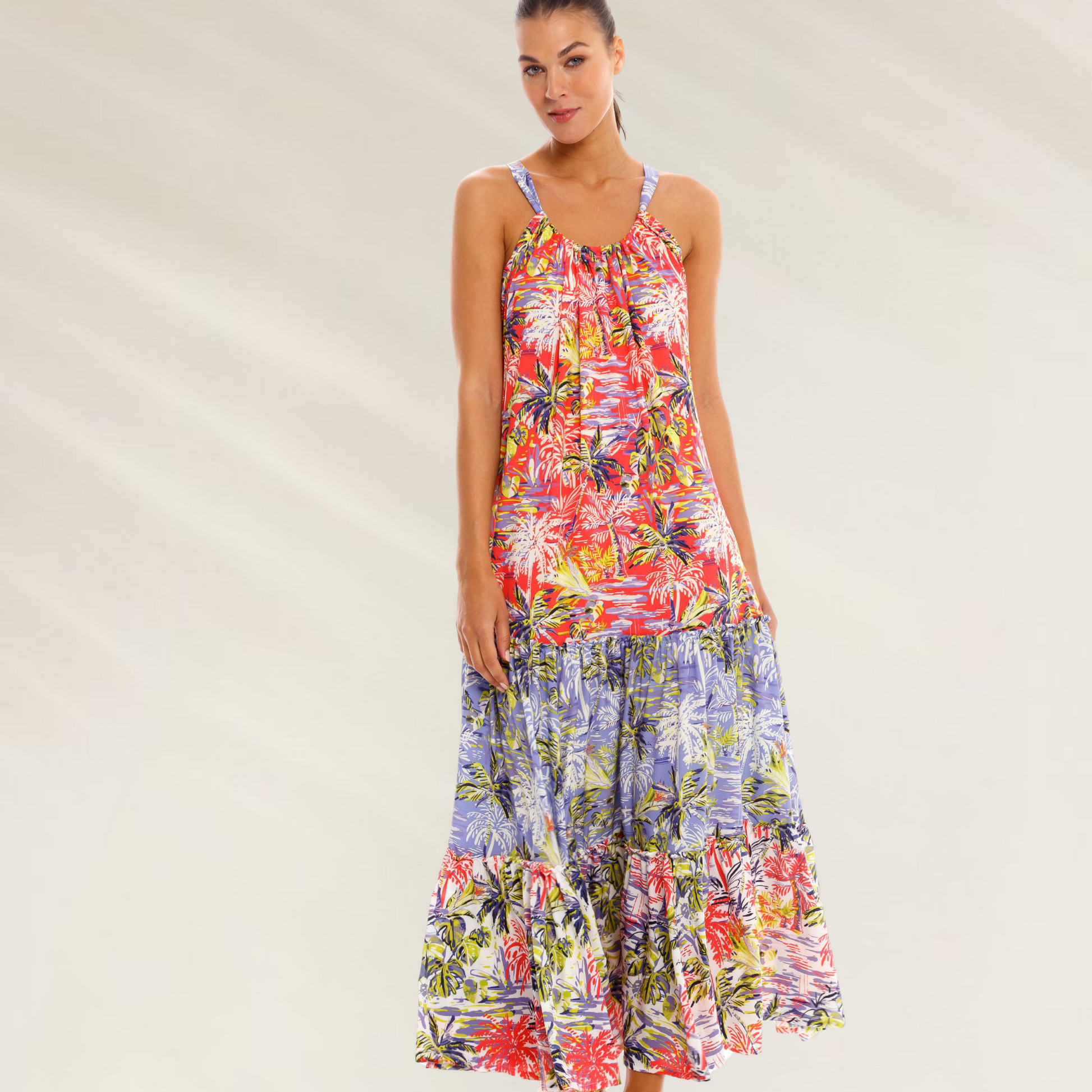 Um vestido leve fluido e irresistivelmente tropical Cosita Linda com estampa floral colorida e design comprido