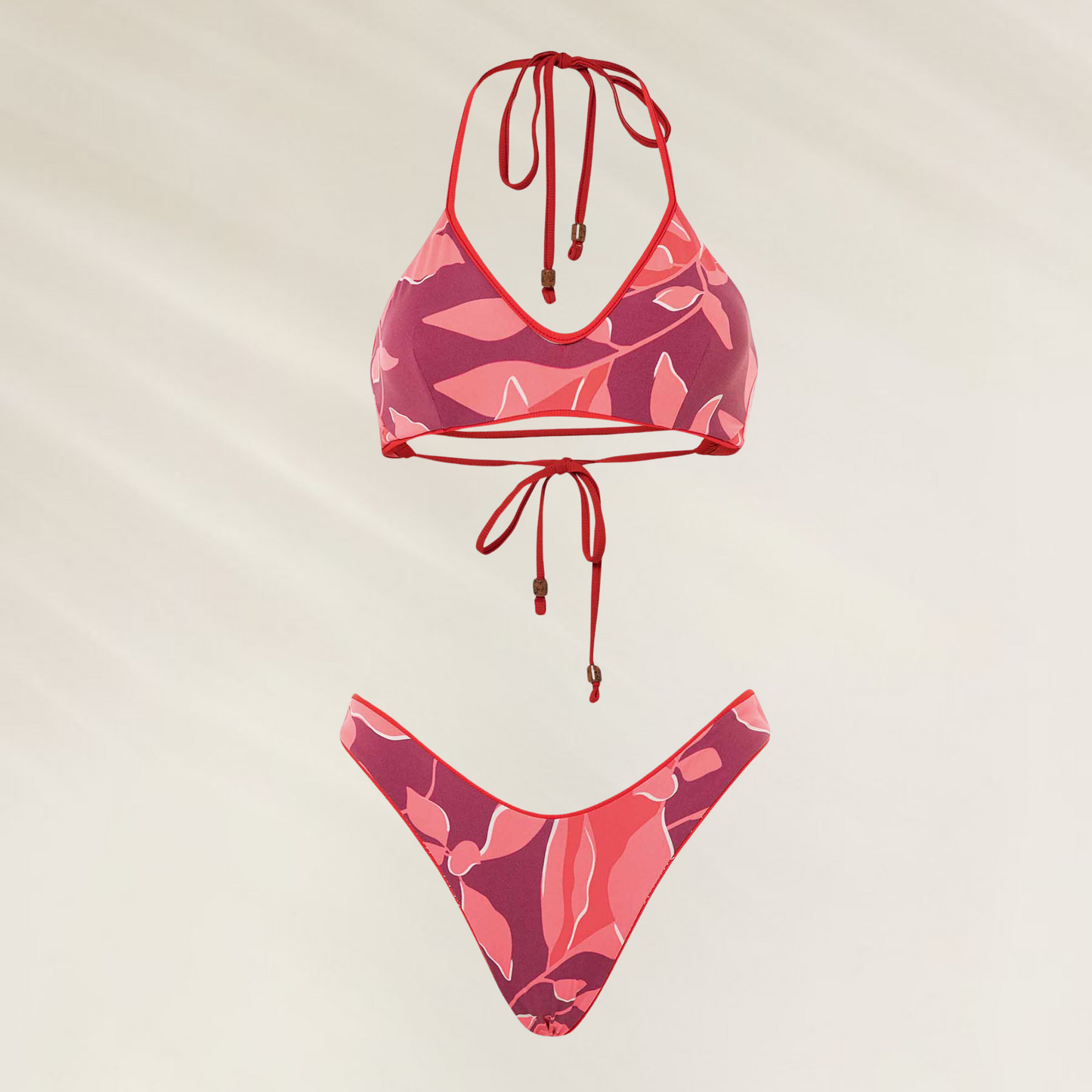Cueca Reversível com Corte Cheeky Maaji em estampa vermelha e rosa para biquíni feminino
