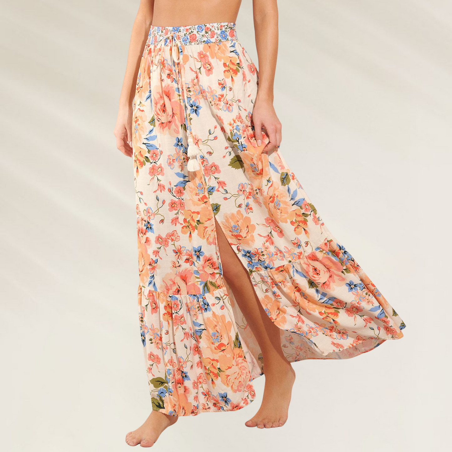 Saia/Vestido com padrão floral da Maaji em tecido leve com estampa floral colorida e detalhe de fenda