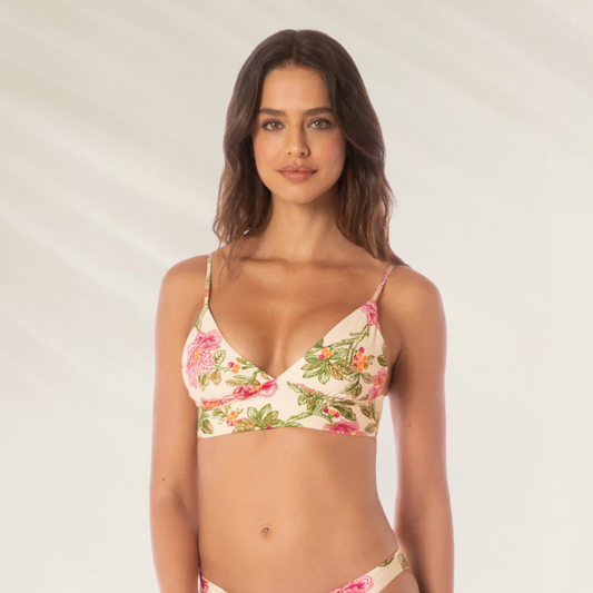 Mulher usando Top Reversível Maaji Copilot – Conforto e elegância com estampa floral e alças finas