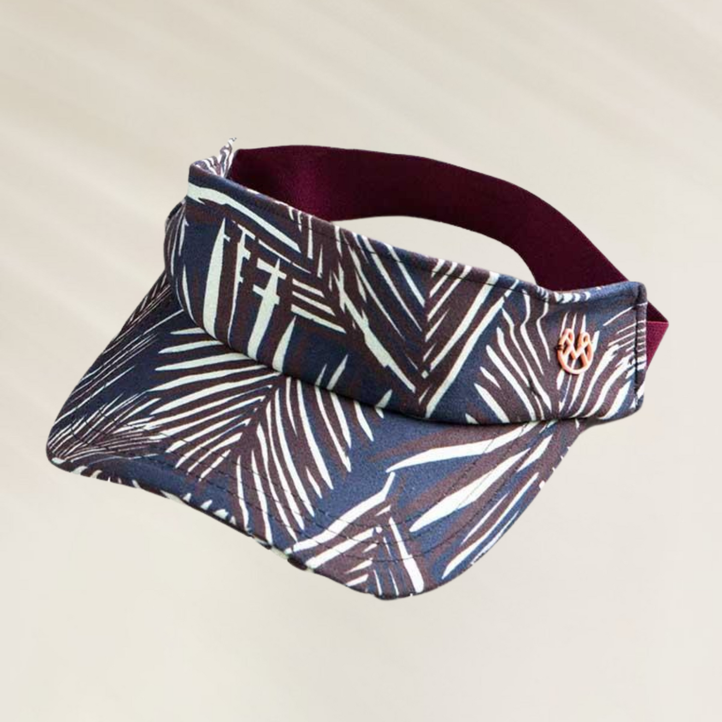 Visor Maaji – Estilo Tropical com Proteção Solar em chapéu com estampa de folhas em tons escuros