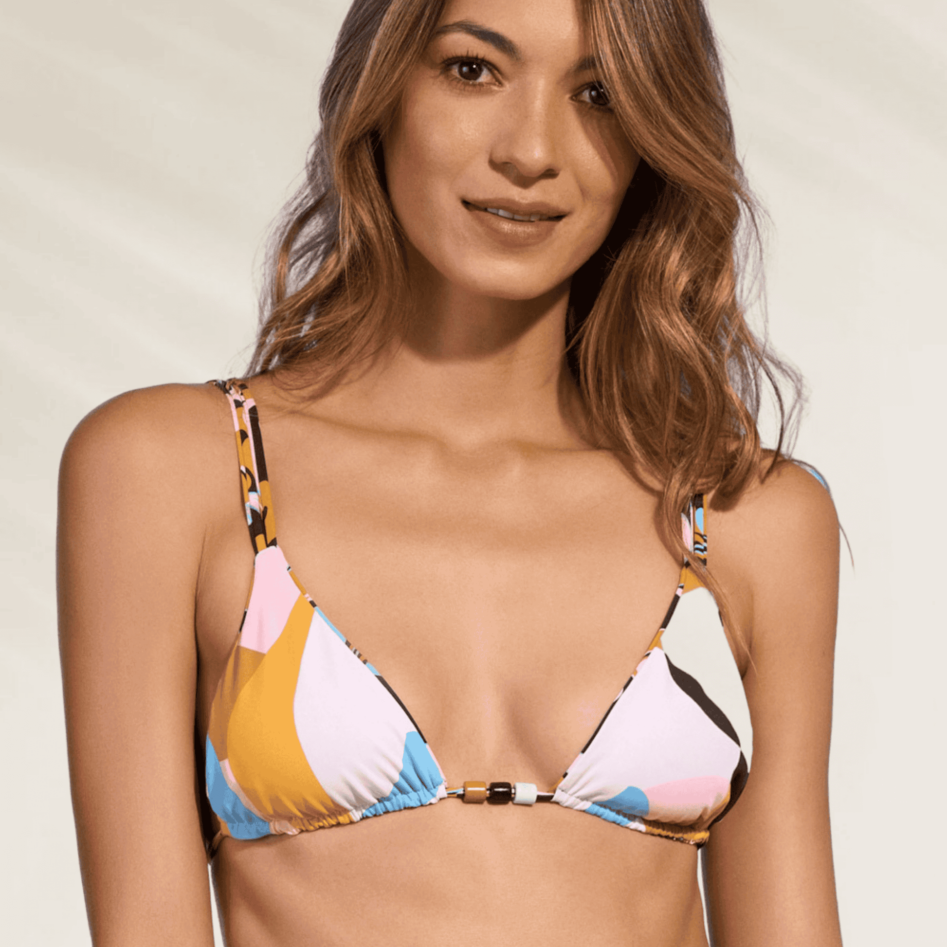 Top de biquini Maaji em estampa colorida com suporte ajustável e alças finas