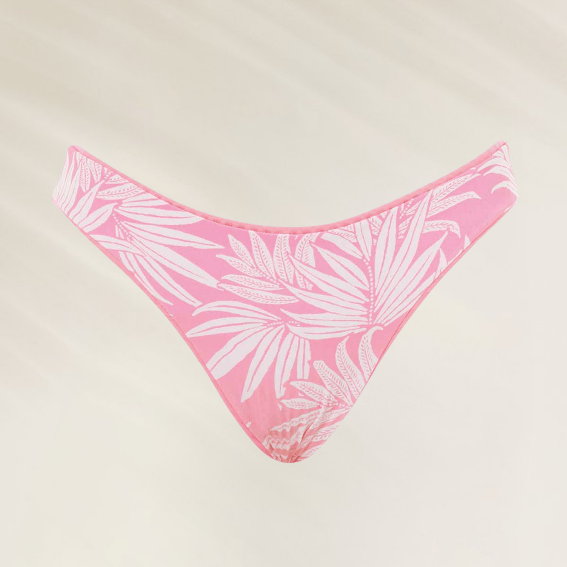 Cueca de biquíni Maaji rosa com estampa de folhas brancas, ideal para dias de sol na praia