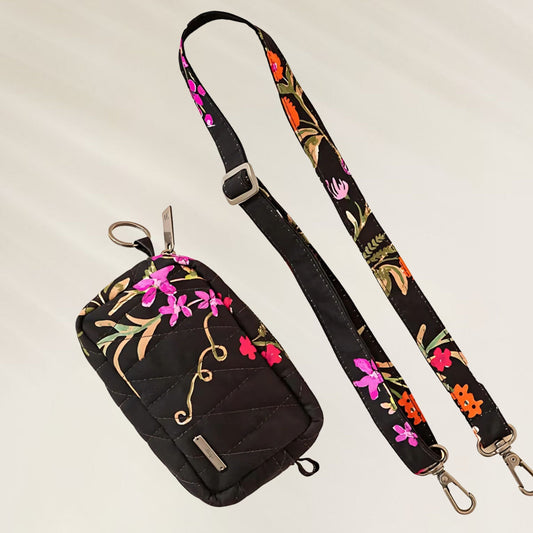 Bolsa Maaji em preto com flores coloridas e alça ajustável para uso diário e casual