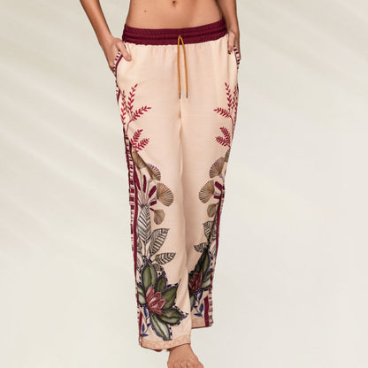 Calças Kartel Solasta com estampa floral e bolso lateral, perfeitas para conforto e estilo