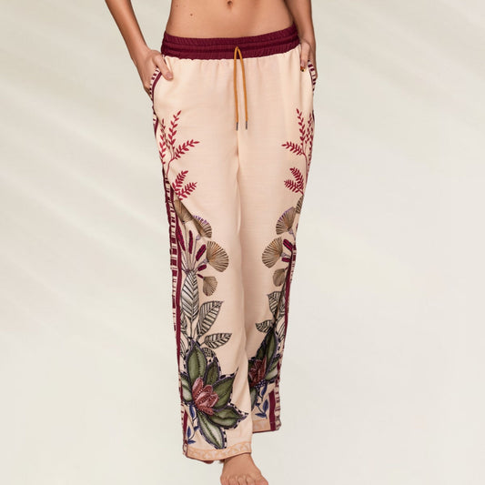 Calças Kartel Solasta com estampa floral e bolso lateral, perfeitas para conforto e estilo