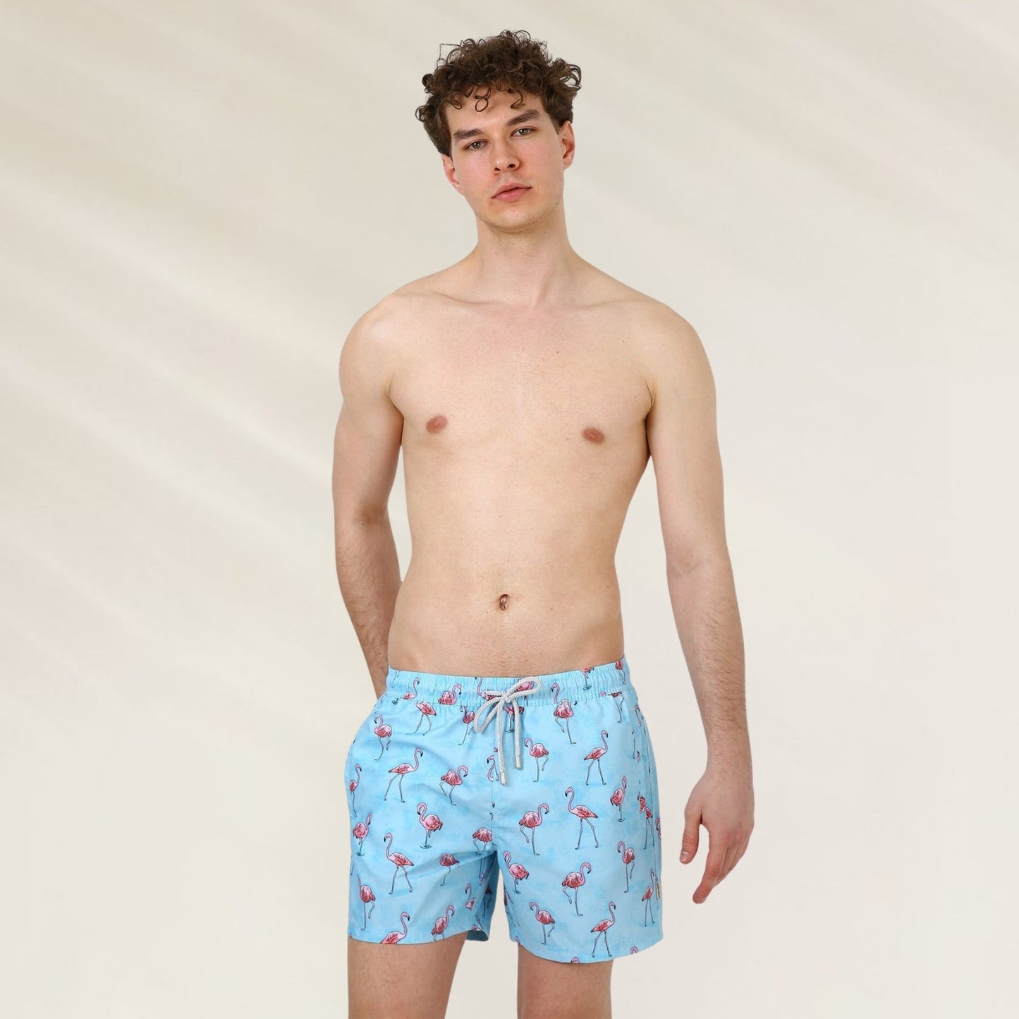 Calções de Banho Homem Flamingo Blue de John Frank com estampa de flamingos em fundo azul