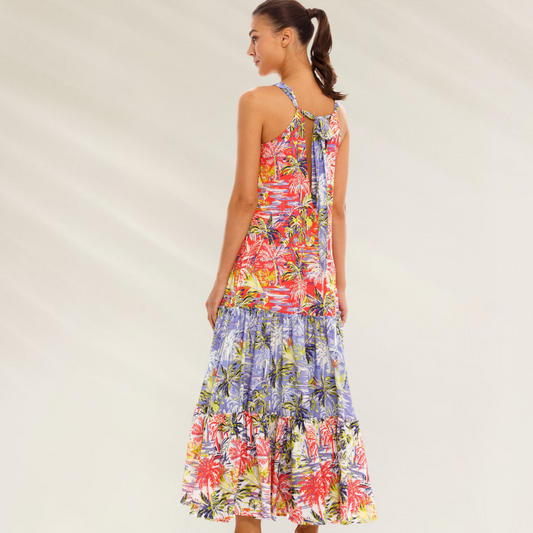 Um vestido leve fluido e irresistivelmente tropical Cosita Linda com estampa colorida e design longo