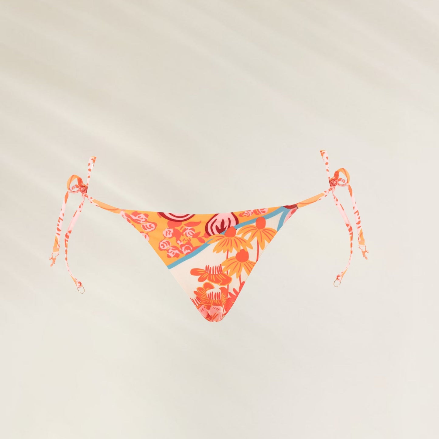 Cueca Reversível Cosmic Tropic Sunflash da Maaji com estampa vibrante e amarrações laterais ajustáveis