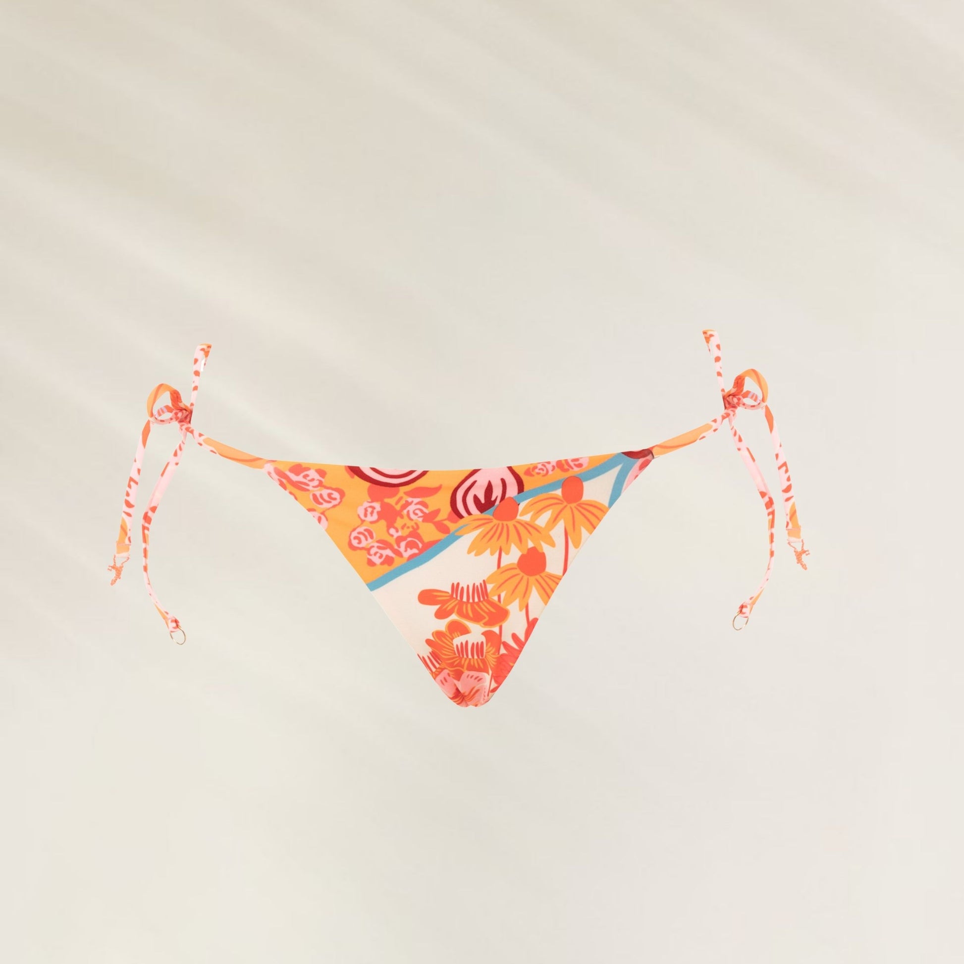 Cueca Reversível Cosmic Tropic Sunflash da Maaji com estampa vibrante e amarrações laterais ajustáveis