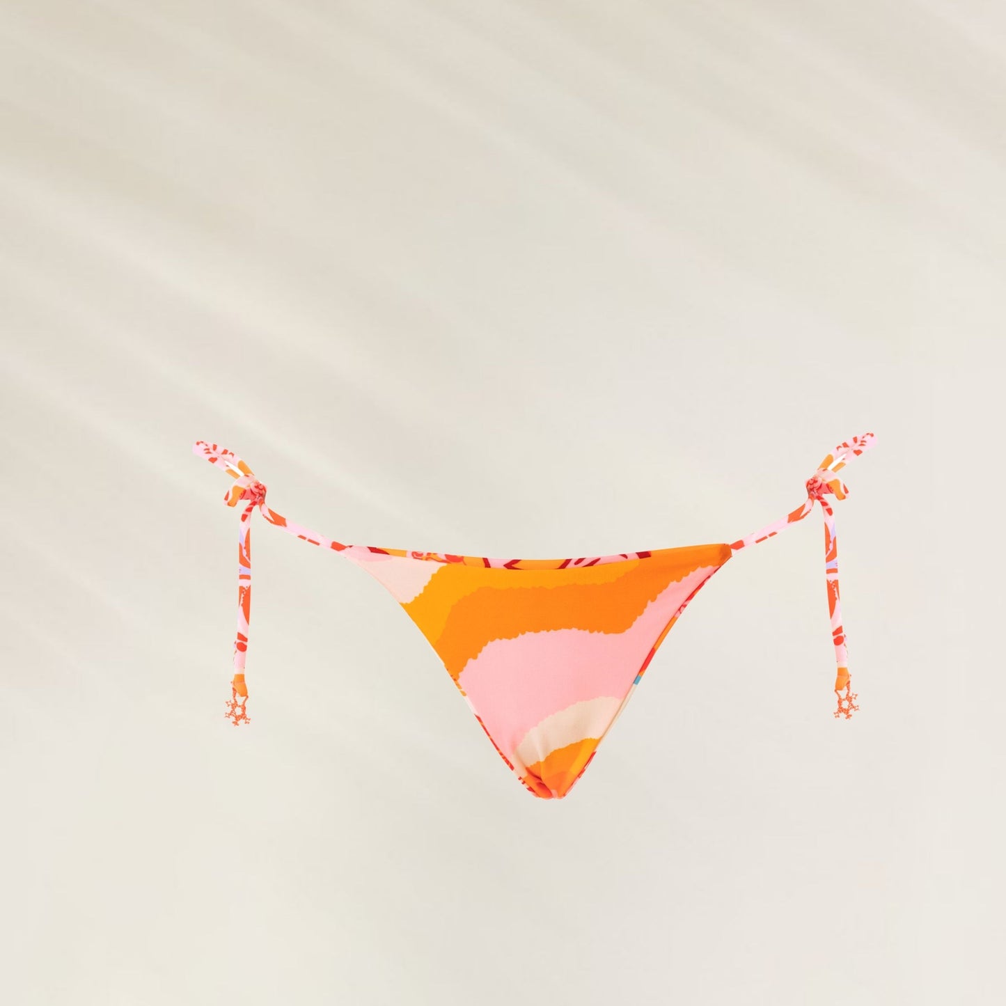 Cueca Reversível Cosmic Tropic Sunflash da Maaji em cores vibrantes e detalhes de amarração