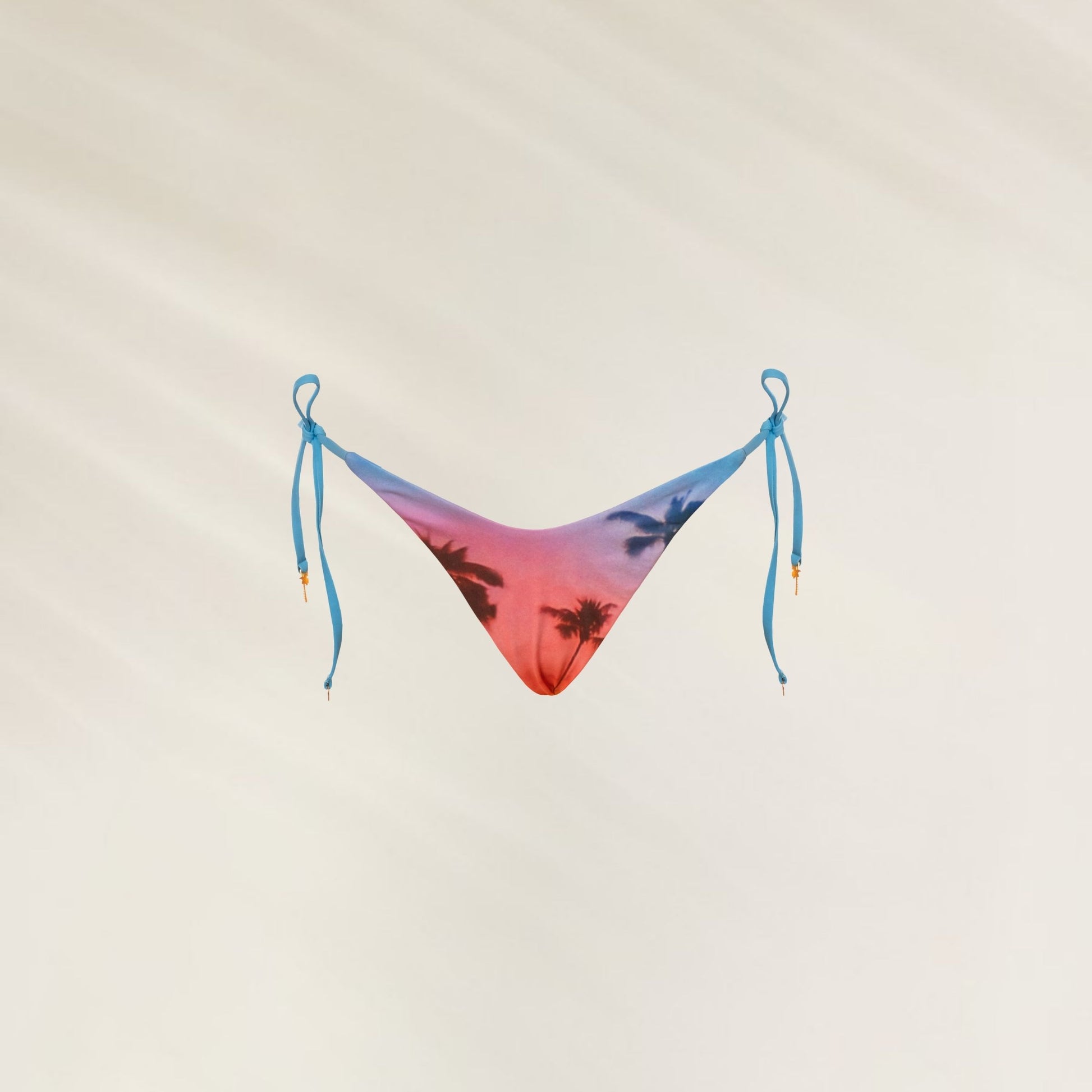 Cueca Reversível Peach Drift da Maaji com estampa colorida e cordões ajustáveis nas laterais