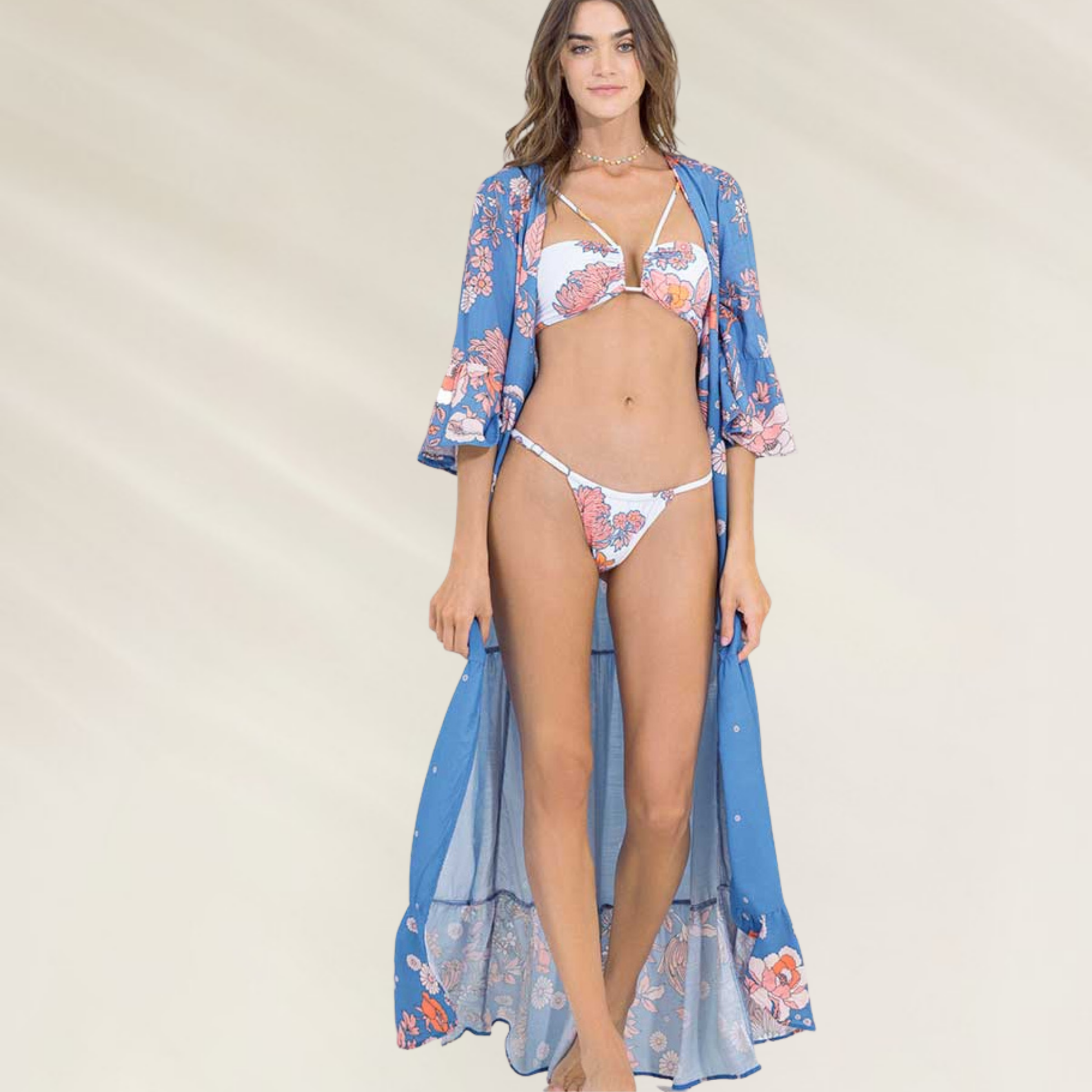 Kimono Longo Floral Maaji – Um Toque de Elegância à Beira-Mar com estampa floral azul e rosa