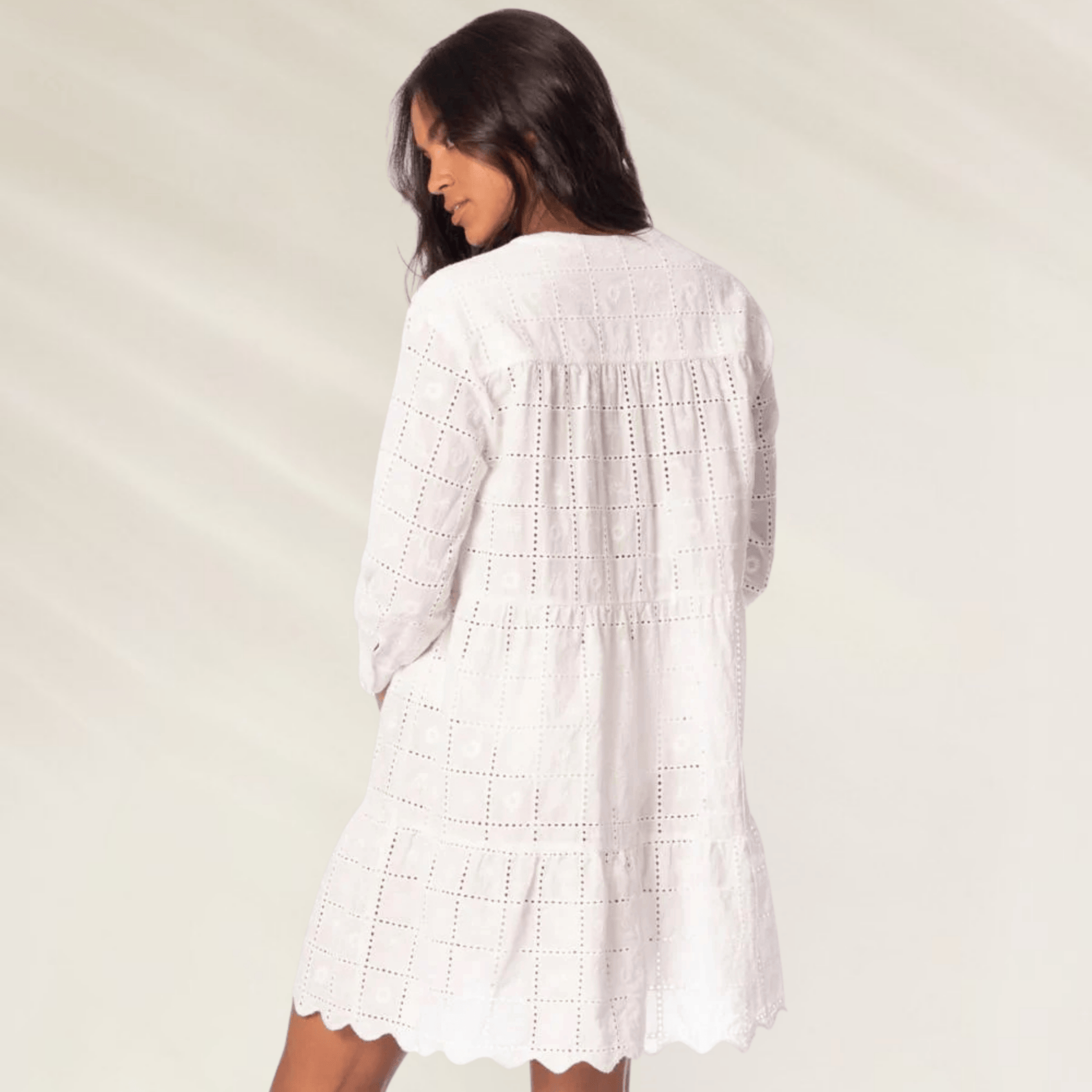 Túnica Maajical Jaguar Ambre Maaji branca com detalhes em recortes e mangas longas