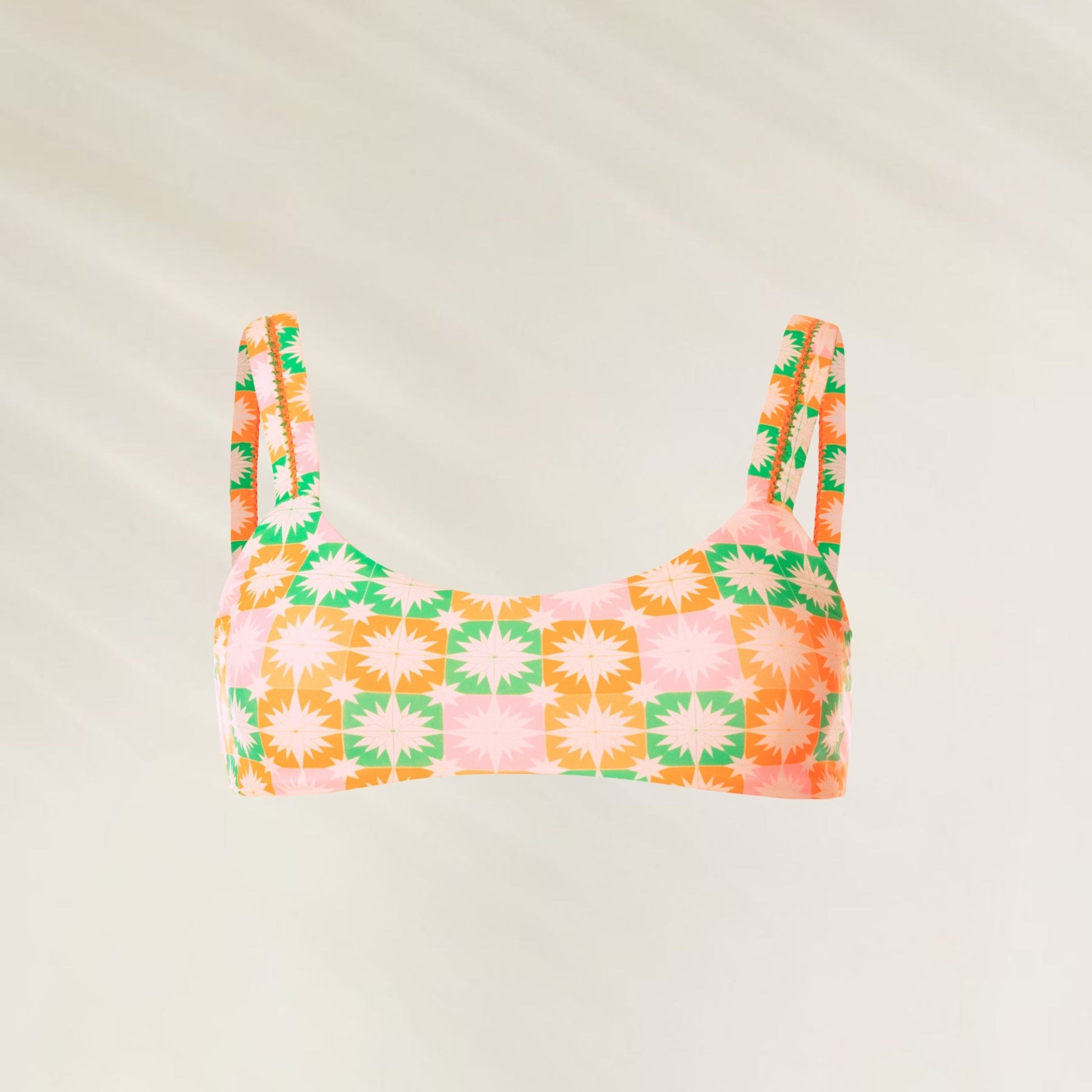 Top de Biquíni Reversível Tropical Tiles com estampa vibrante em tons de rosa, laranja e verde