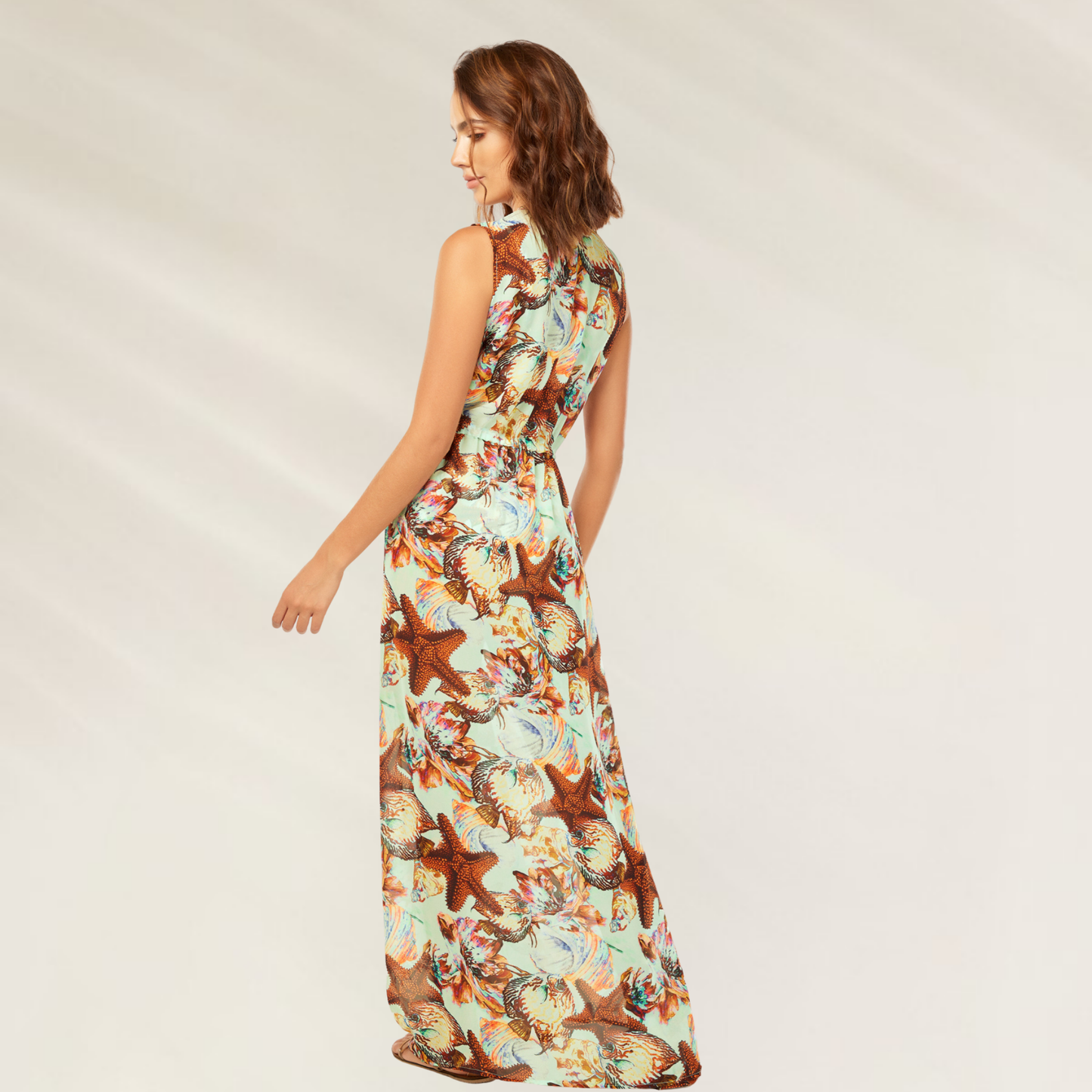 Vestido Comprido Estampado Tropical da Cosita Linda com tema de estrelas do mar e flores