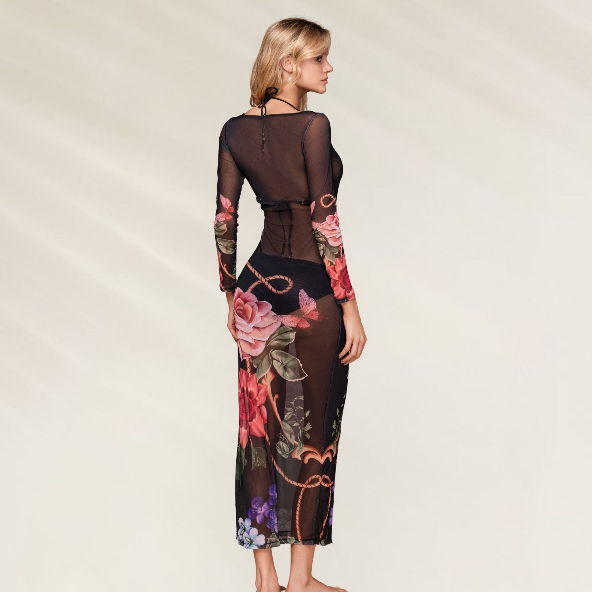 Vestido de Praia Kate Bloom com estampa floral e mangas longas, ideal para looks de verão