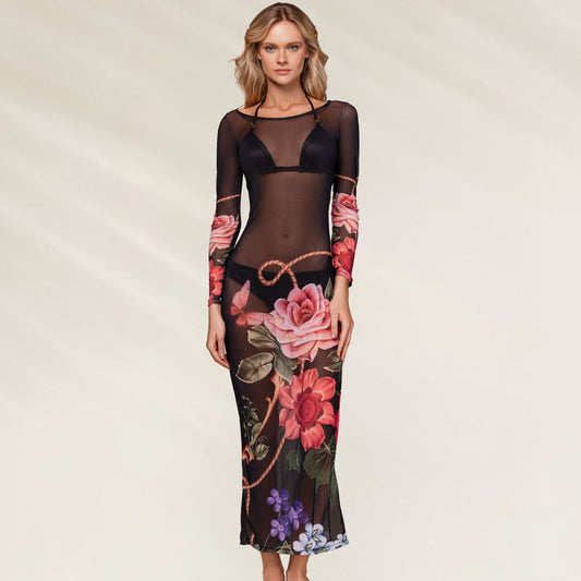 Modelo usando o Vestido de Praia Kate Bloom com estampas de flores vibrantes e mangas longas