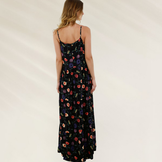Vista traseira de vestido longo floral Malai preto com estampa colorida e alças finas