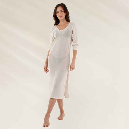 Vestido Longo Malai em Malha de Algodão com listras coloridas e babados nas laterais visto por trás